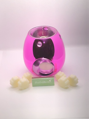 flamingo pink wax melt burner with a set of melts
