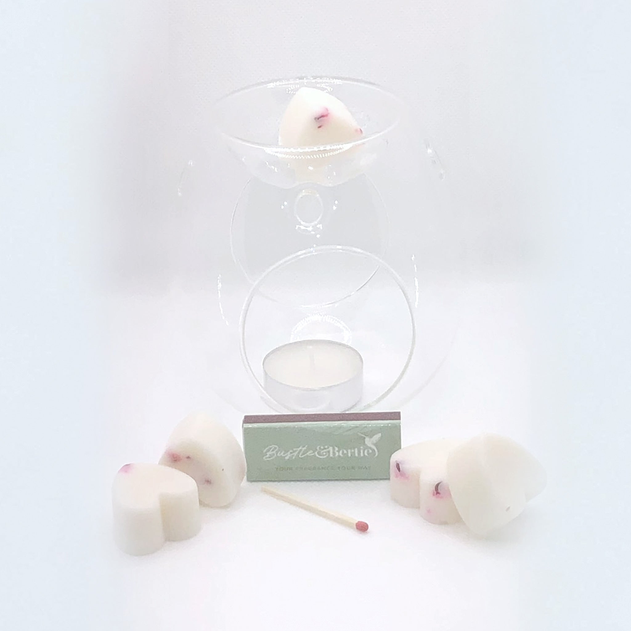 Clear Wax Melt Burner with 6X Melts. Please choose fragrance from our selection you wish to have in and add them to the order in your notes